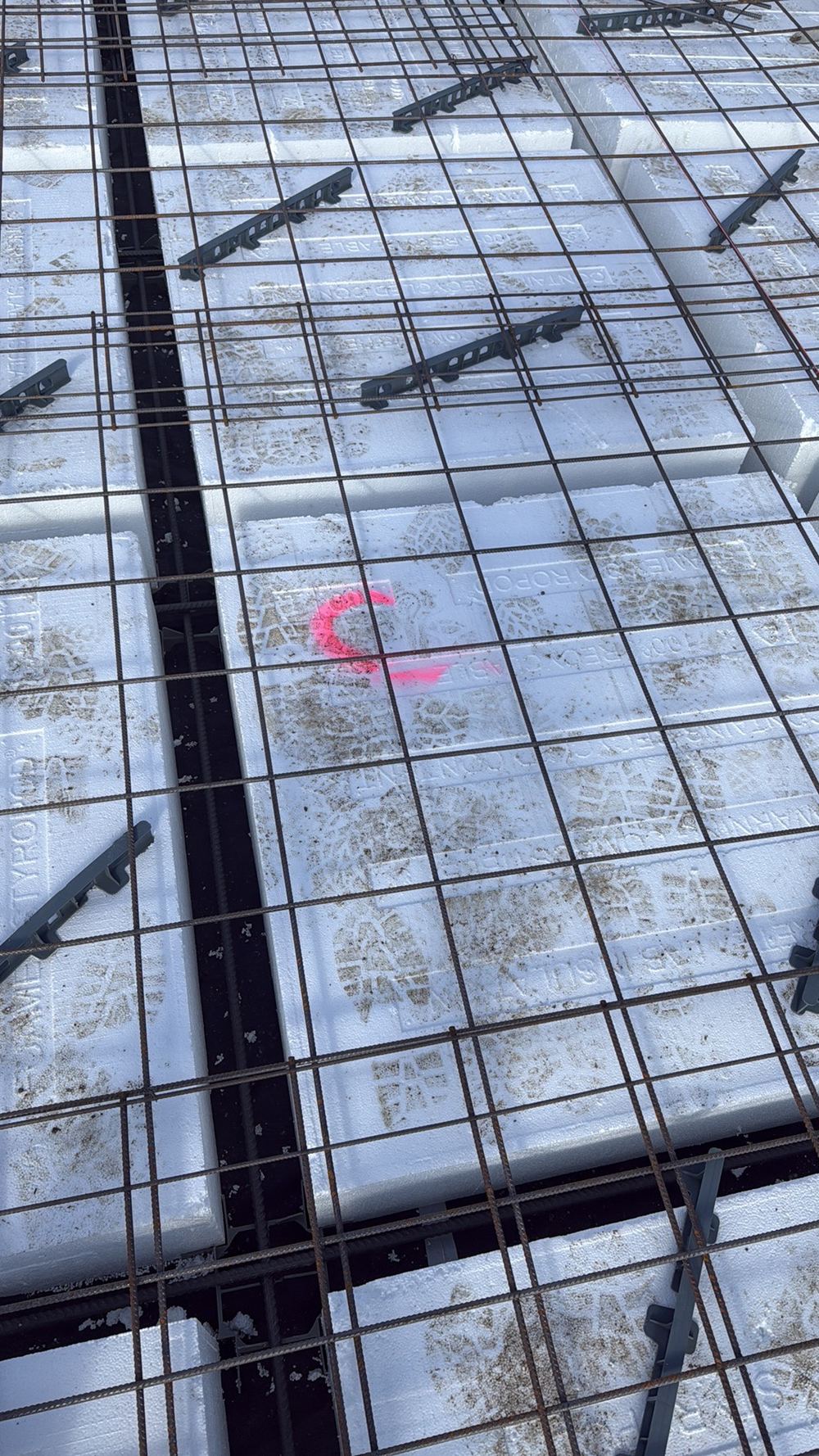 More bar chairs needed so the mesh keeps its cover inside the concrete, found during a slab pre-pour inspection in Sunbury
